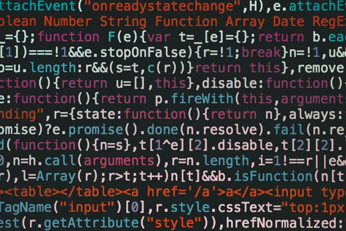 Lines of colorful JavaScript code displayed on a dark screen