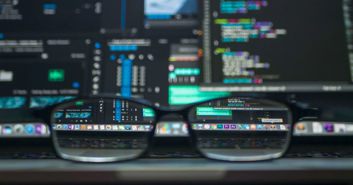Source code reflected in a pair of eyeglasses