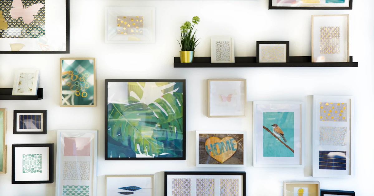 Assorted framed pictures on a wall