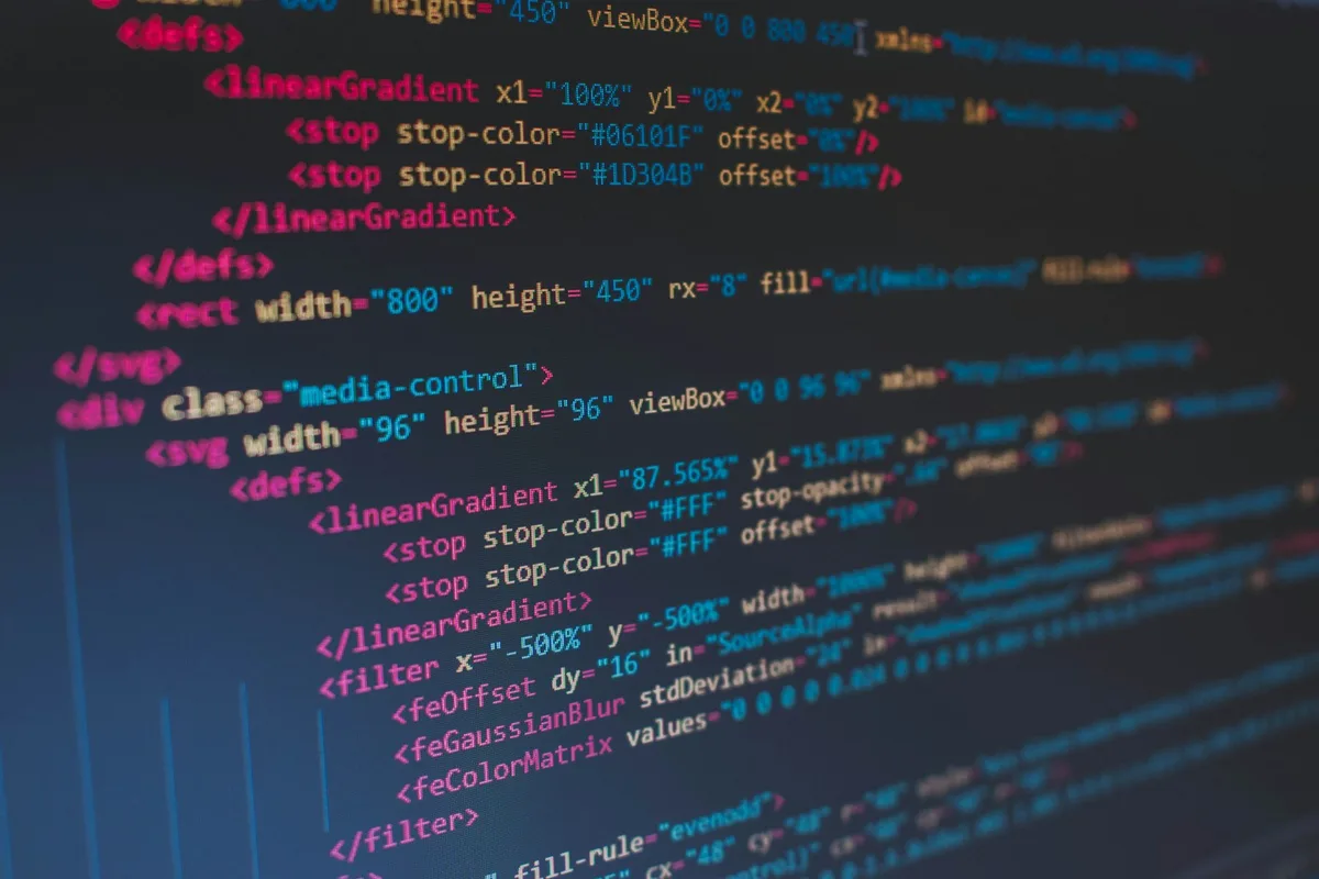 Lines of HTML markup on a dark editor screen
