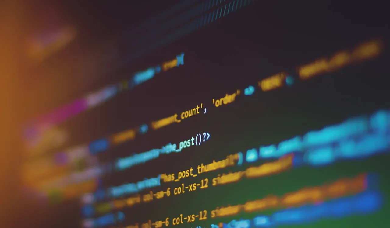 A terminal window open in a dark IDE showing TypeScript code and CLI output from a React project build