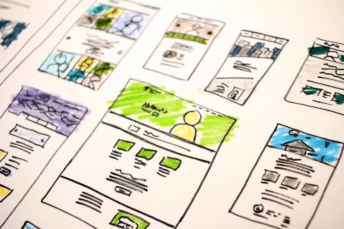 Assorted colour layout sketches on paper