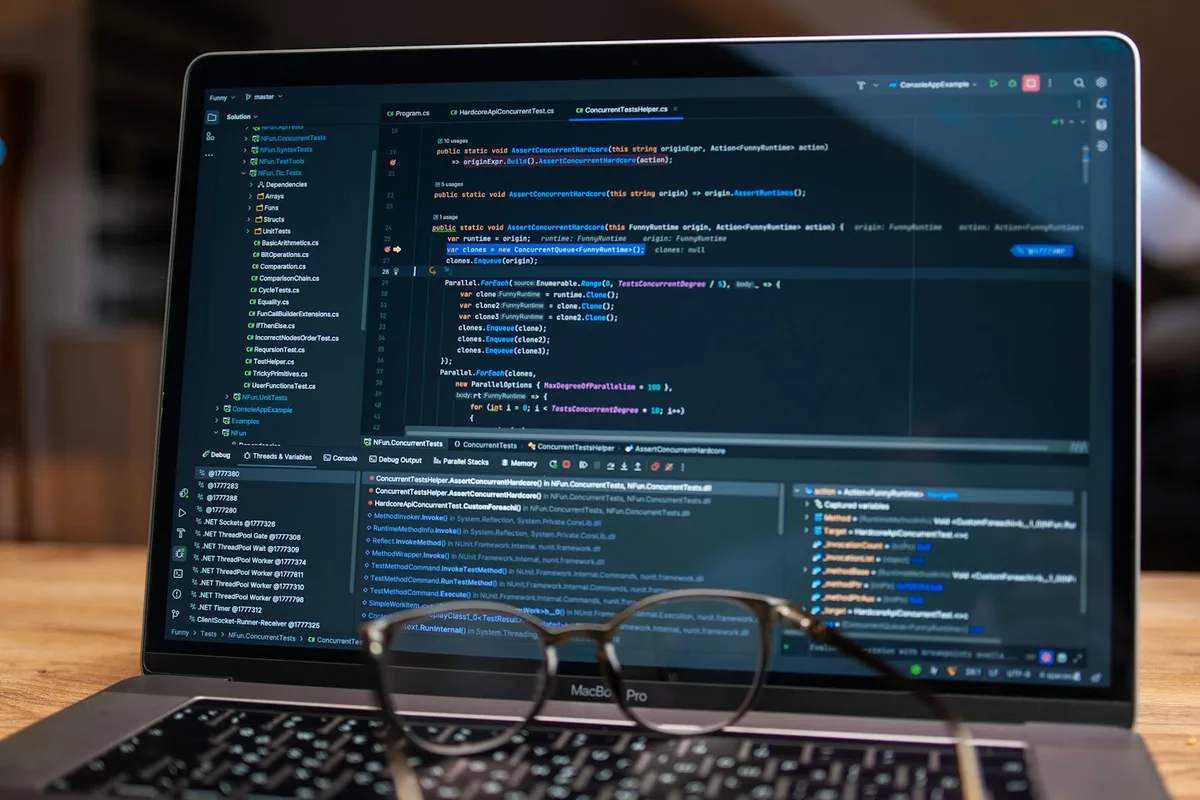 Laptop screen displaying lines of code