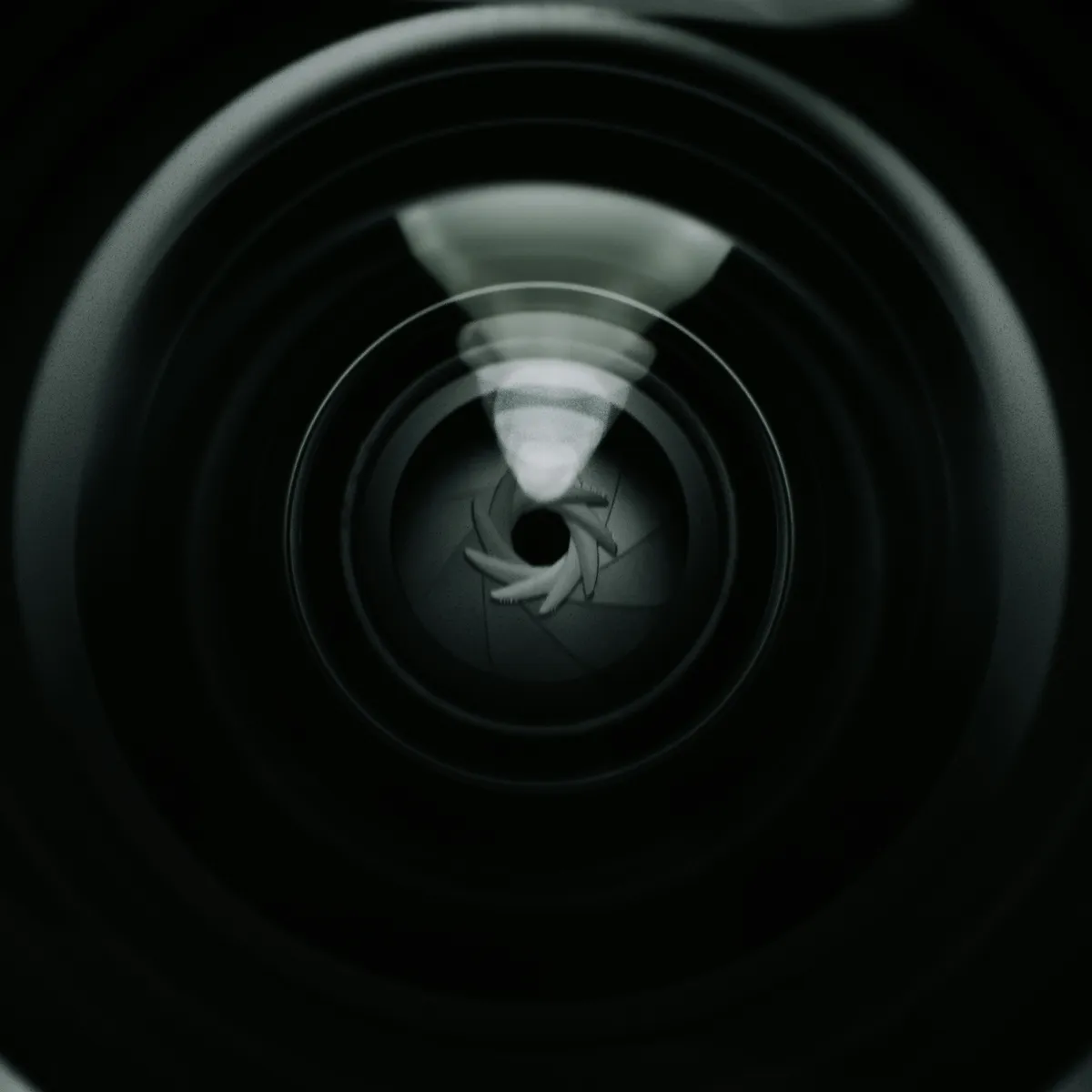 Extreme close-up of a camera lens aperture and iris blades