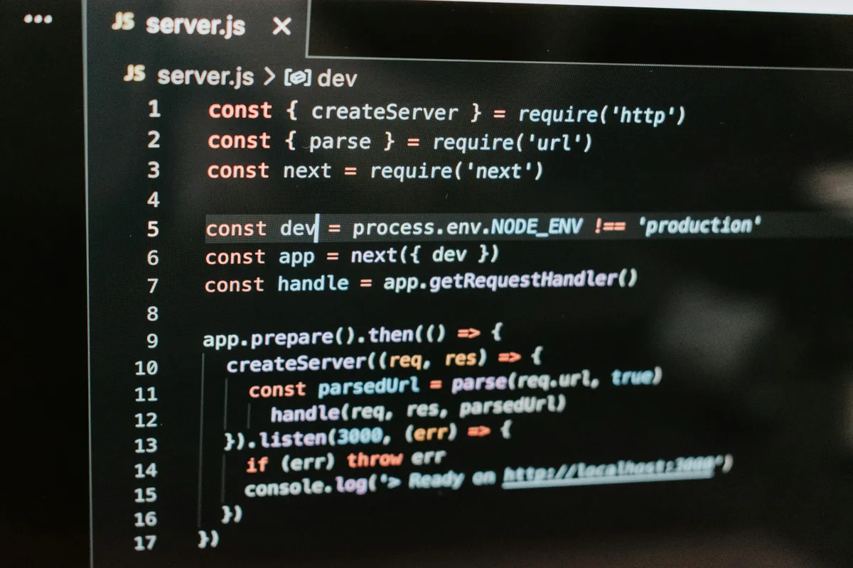 A code editor showing a Next.js server.js file with require and NODE_ENV checks
