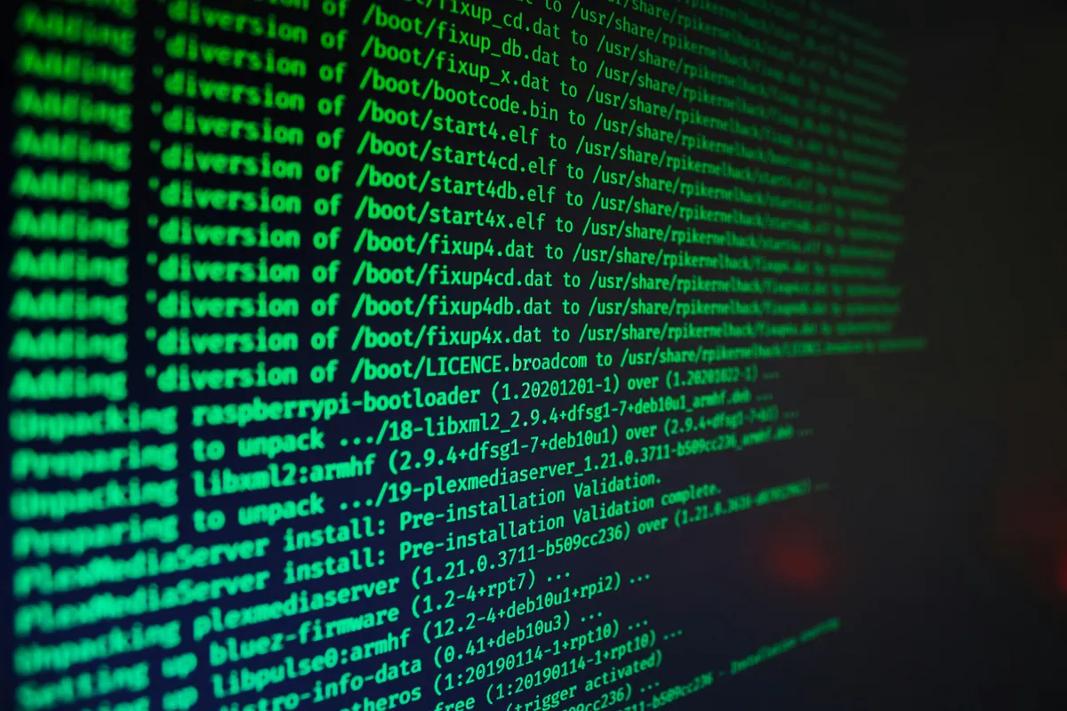 A terminal filling with green build and install log output during a migration